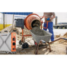 Constriction worker making concrete in an orange mixer